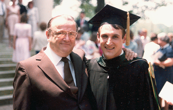 Chris Larsen at his Emory medical school graduation with his father, a cardiac surgeon. 