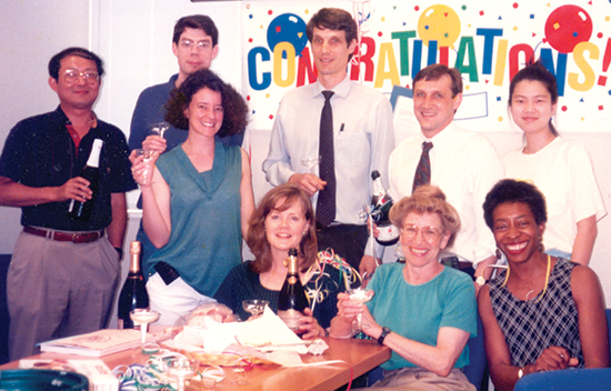 Larsen, Pearson, and faculty and staff of the Emory Transplant Center celebrate the publication of their paper on co-stimulation blockade in Nature. 