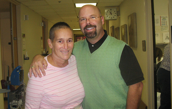 Susan McKessy (in pink) rebuilt her life after stroke at Emory’s Center for Rehabilitation Medicine. Today she volunteers at the center, where she works alongside several of the clinicians who helped her during recovery. 