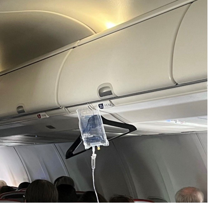 IV hanging on a plane